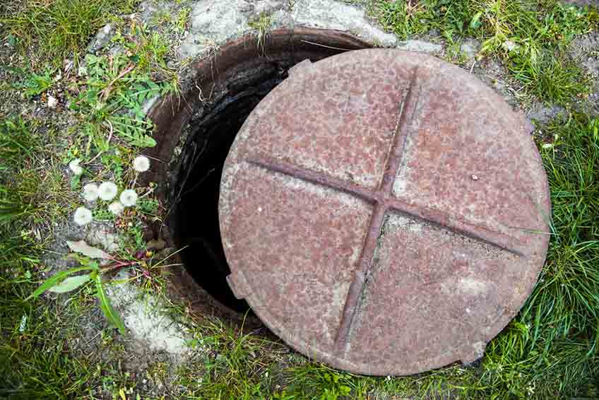 corroded manhole cover