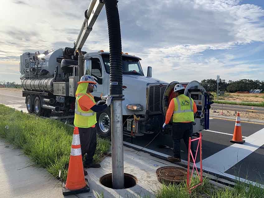 Contractors Working on Commercial Storm Drain